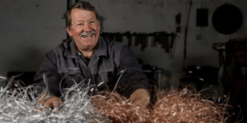 A Mauviel craftsman at the bench in Villedieu-les-Poeles